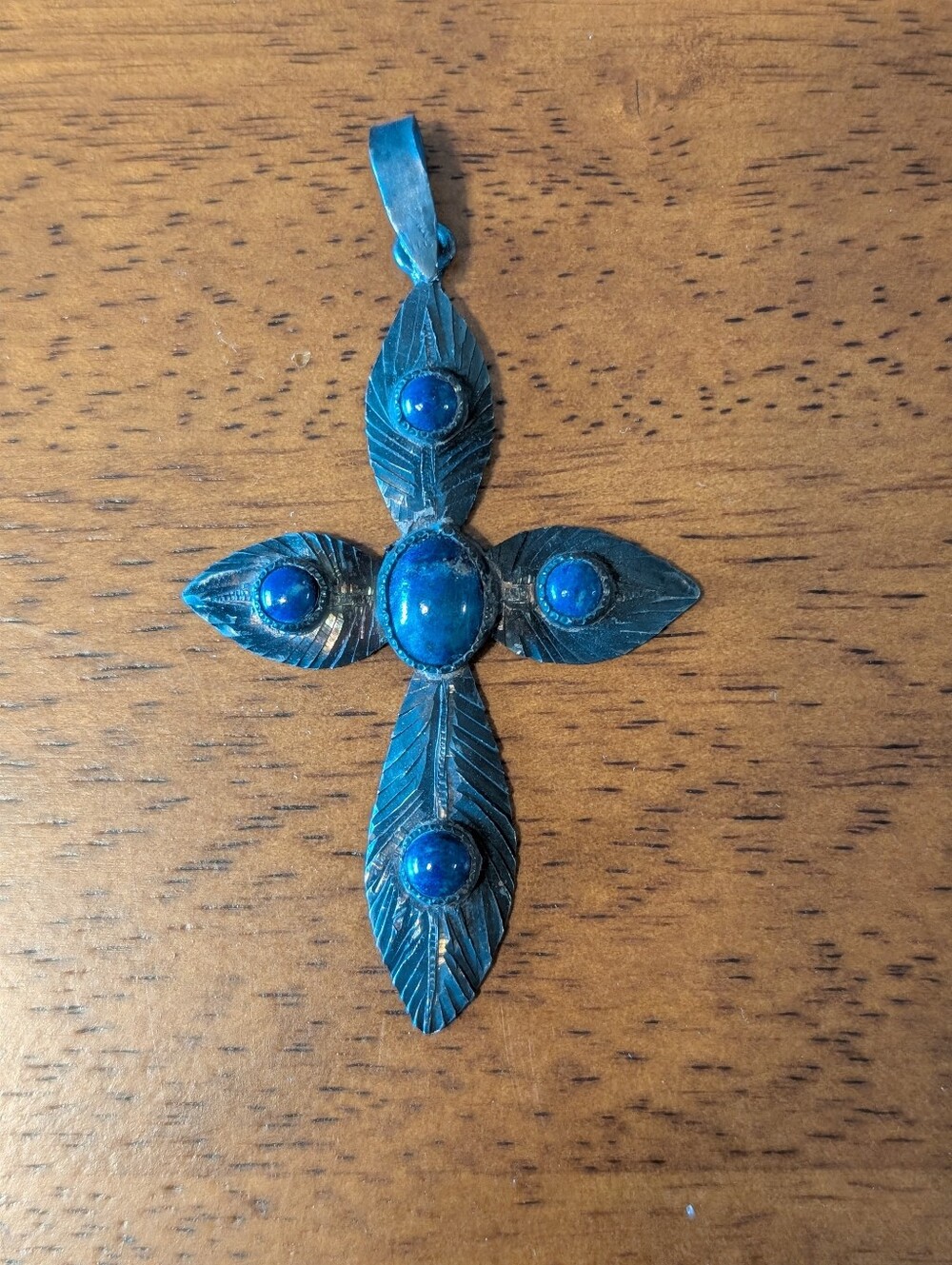 Sterling Silver Cross Pendant with Blue Stone Accents